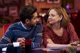 Adhir Kalyan and Jayma Mays in "United States of Al" on CBS.