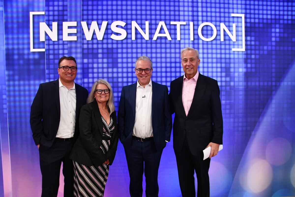 Nexstar Networks President Sean Compton, NewsNation's Cherie Grzech and Michael Corn, and Perry Sook, chairman of Nexstar.