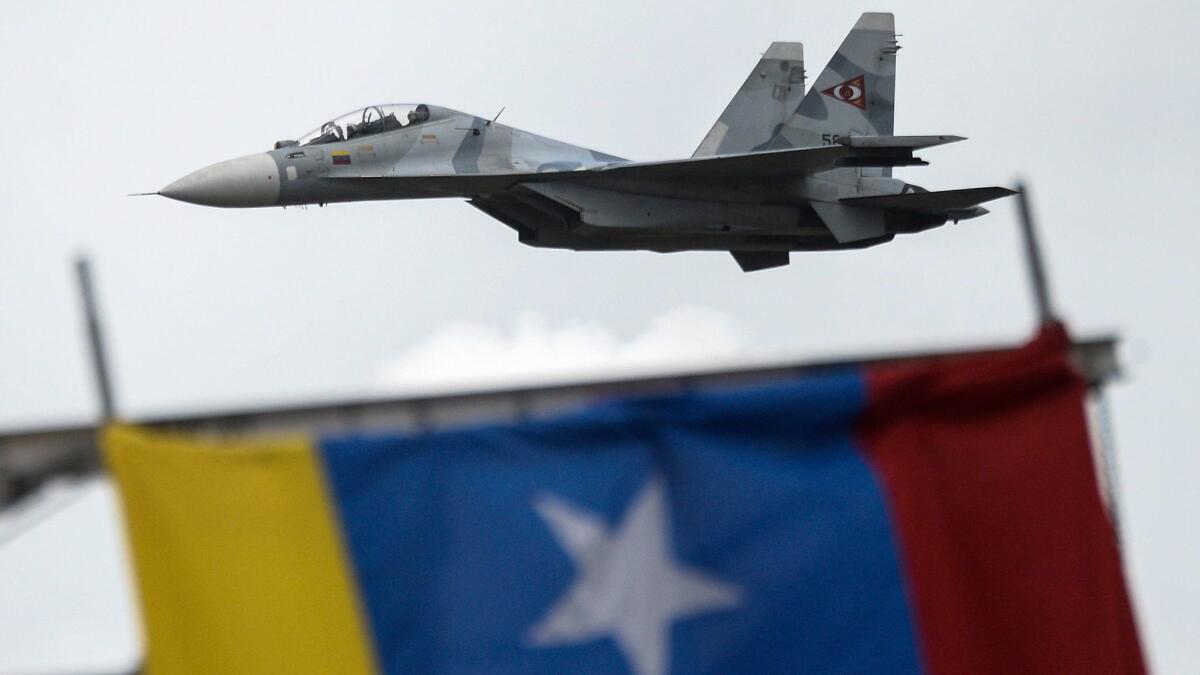 A Russian-made Venezuelan air force Sukhoi jet fighter takes part in a July 2017 military parade in Caracas.