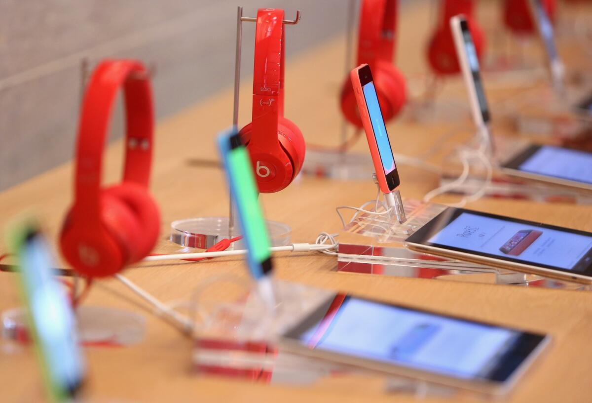 Apple's mobile devices on display in an Apple store in Berlin on Dec. 1.