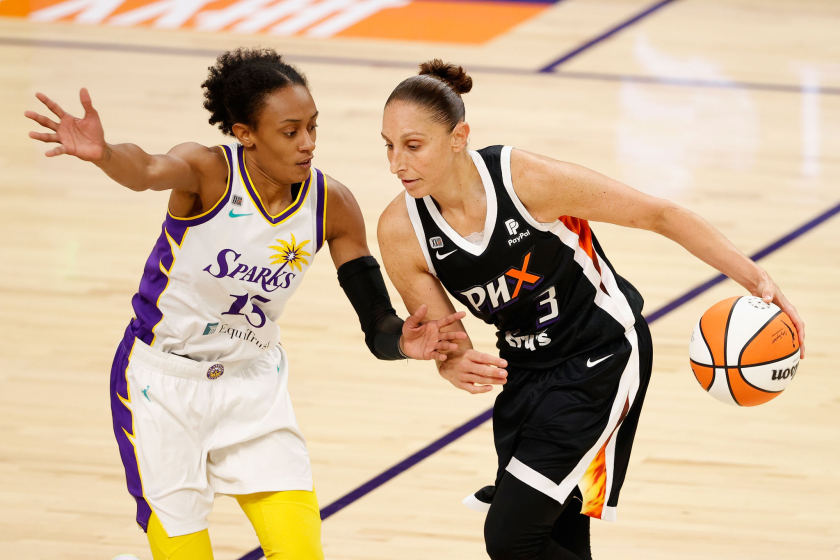 PHOENIX, ARIZONA - JUNE 27: Diana Taurasi #3 of the Phoenix Mercury handles the ball against Brittney Sykes.