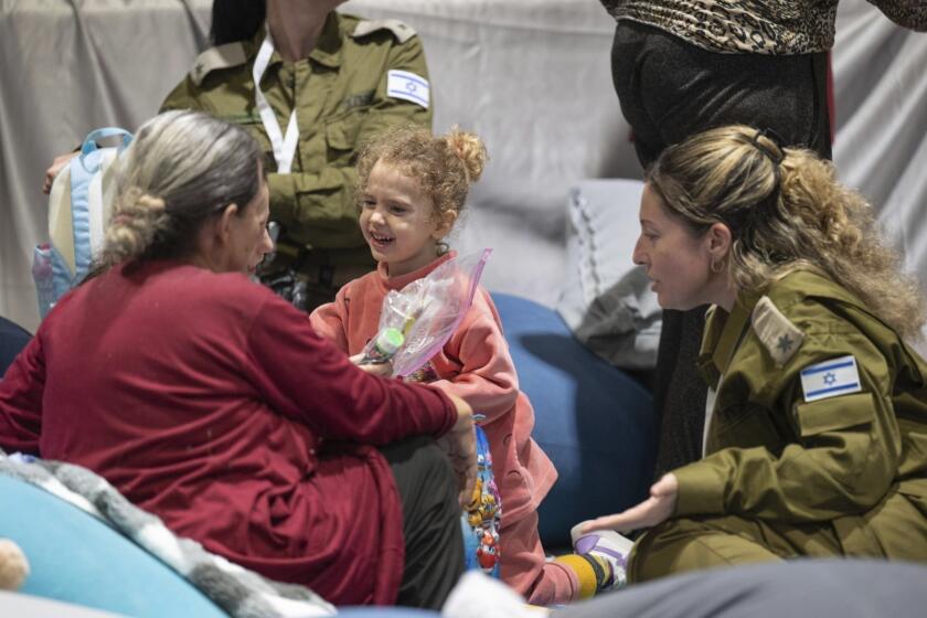 This handout photo provided by the Israel Prime Minister Office shows Yahel Shoham, 3 years old, upon her arrival in Israel after being freed. Yahel was one of the 13 Israeli hostages that Hamas released late Saturday, Nov. 25, 2023, in the second round of swaps under a cease-fire deal. (Israel Prime Minister Office/Handout via AP)