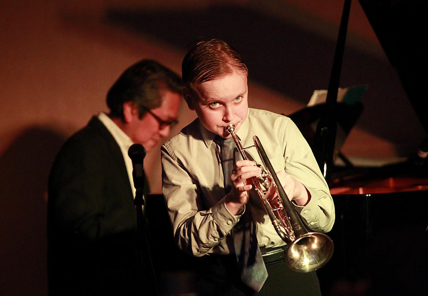 13-year-old trumpet sensation Geoff Gallante performs "Cheek to Cheek" during the opening night "Dine with Duos and Trios" at the 14th annual Newport Beach Jazz Party in Sam and Harry's at the Newport Beach Marriott on Thursday.