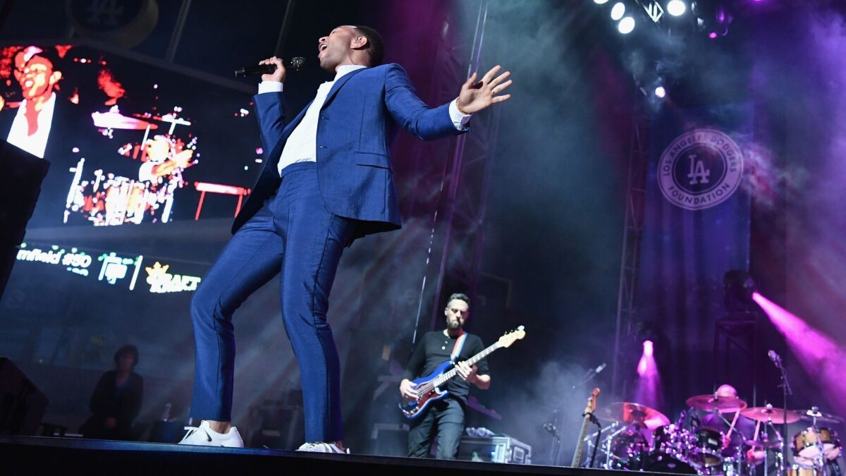 John Legend performs onstage Monday at the fourth annual Los Angeles Dodgers Foundation Blue Diamond Gala at Dodger Stadium, which raised $2.2 million for charity.