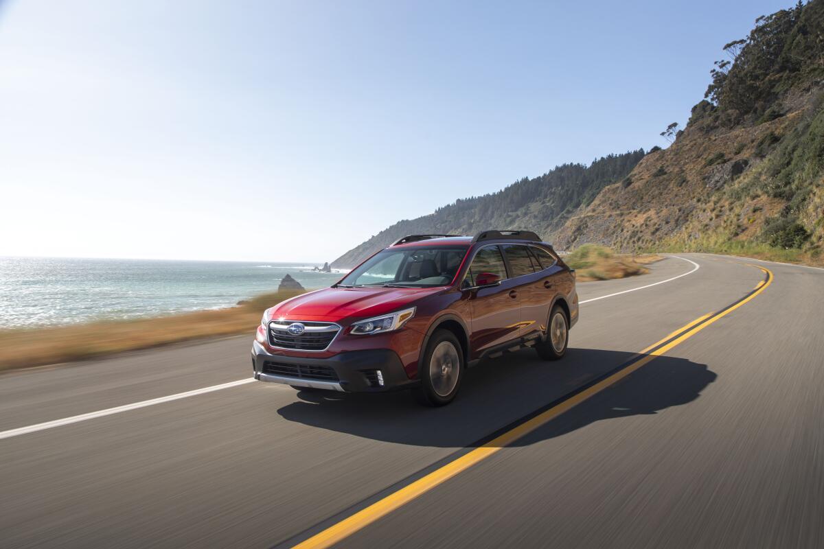 This undated photo from Subaru shows the Outback, a midsize crossover with a maximum towing capacity of 3,500 pounds, which is suitable for decently sized boats and campers. (Courtesy of Subaru of America via AP)