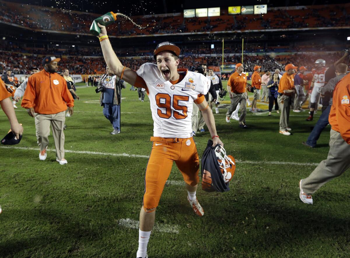 Clemson punter Andy Teasdall (95) celebrates after the Tigers defeated Ohio State in the Orange Bowl on Jan. 4, 2014.