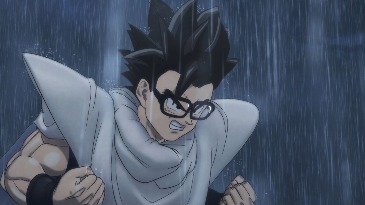 a man with glasses and a cape standing in the rain