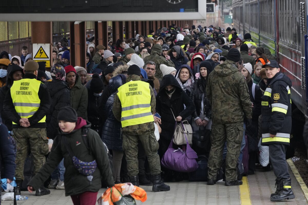 Refugees from Ukraine arrive to the railway station in Przemysl, Poland