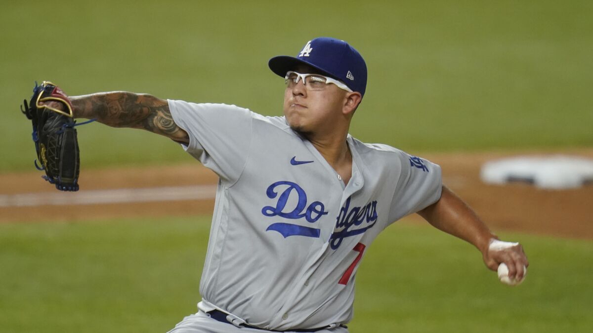 Los Angeles Dodgers' Julio Urias pitches against the San Diego Padres during the second inning in Game 3.