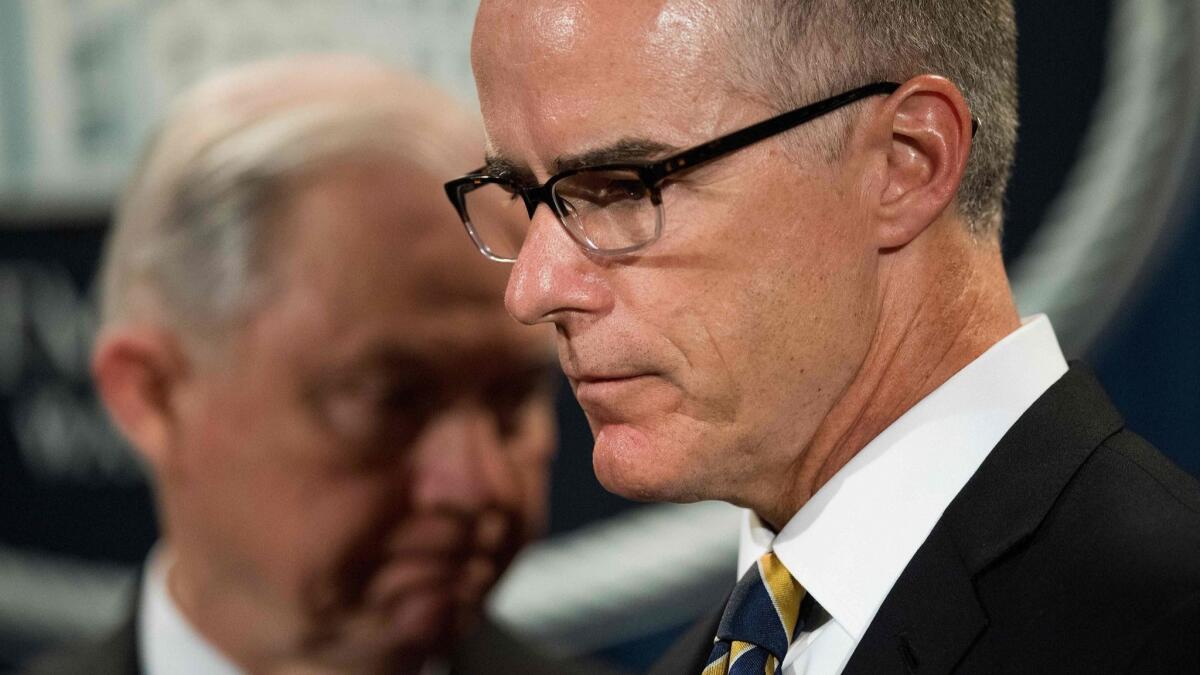Andrew McCabe at a news conference with Atty. Gen. Jeff Sessions on July 13, 2017.