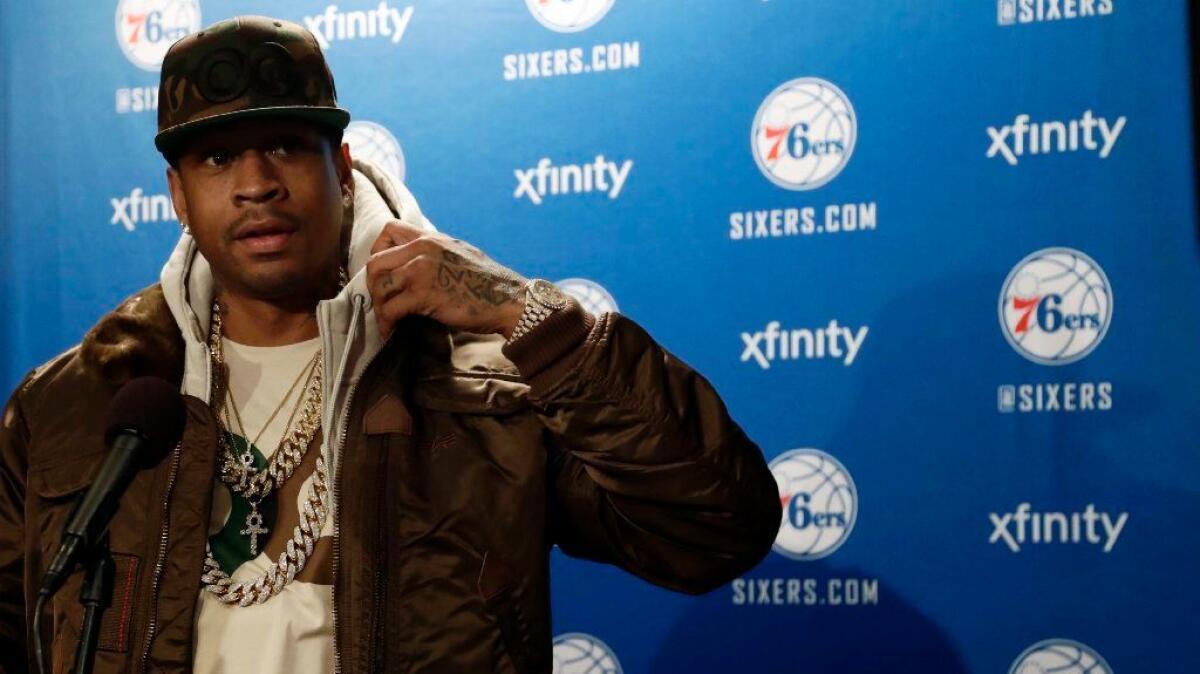 Former 76ers guard Allen Iverson, shown speaking to the media before Friday's game between the Lakers and the 76ers, is still beloved by basketball fans in Philadelphia.