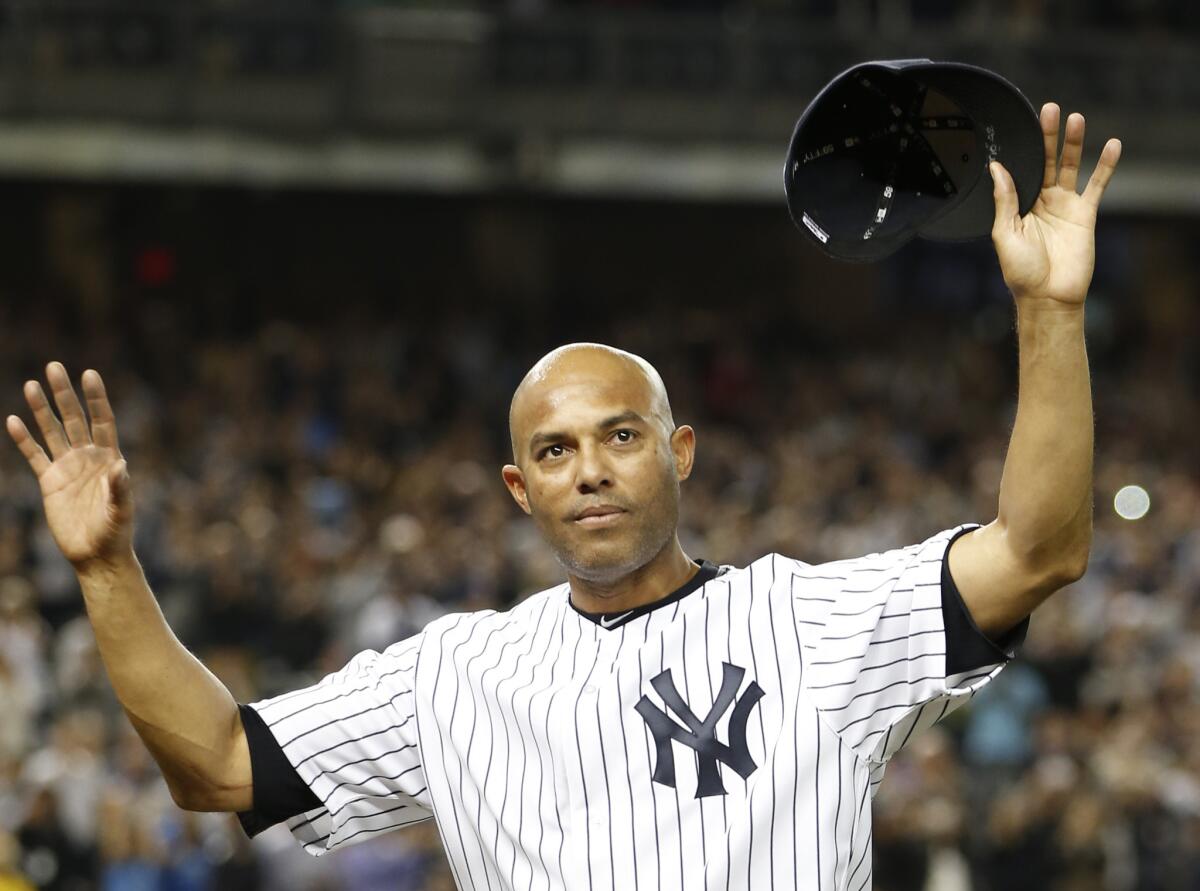 Mariano Rivera acknowledges the crowd's standing ovation on Sept. 26, 2013, after coming off the mound in the ninth inning of his final appearance in a baseball game at Yankee Stadium