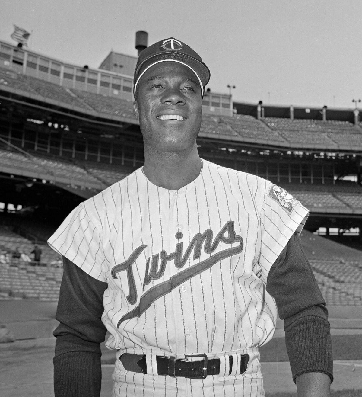 In this June 21, 1964, file photo, Minnesota Twins pitcher Jim "Mudcat" Grant poses.
