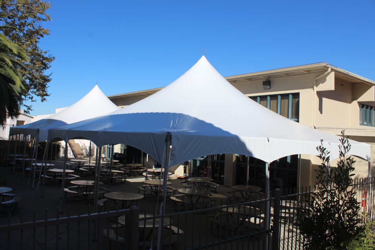 Newly installed tents on the R. Roger Rowe campus.