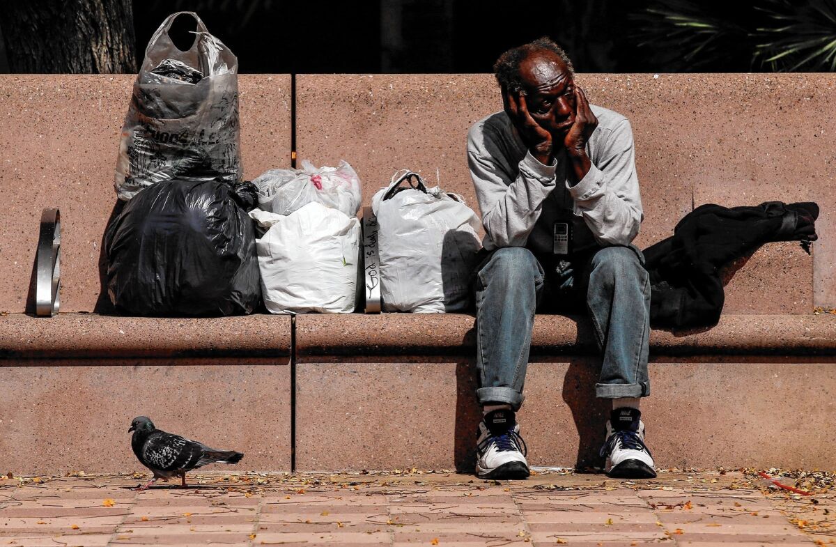 A homeless man in downtown L.A.'s Pershing Square.