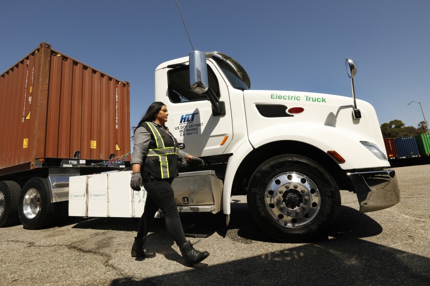 Lorraine Gallo is the primary driver of an electric truck in Total Transportation Services' fleet at the L.A. port.