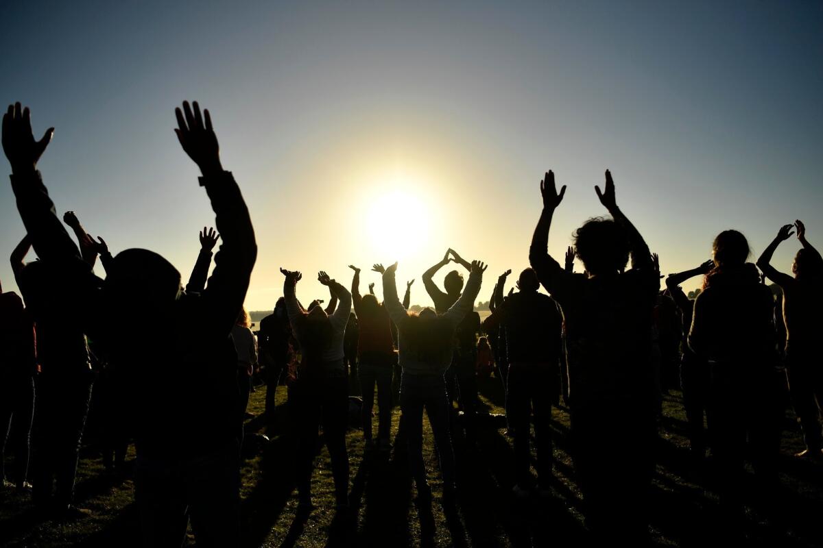 Visitors attend the summer solstice celebration at the ancient Stonehenge monument in Wiltshire, England.