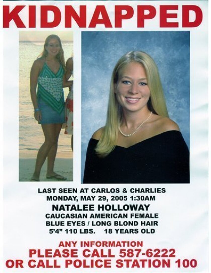 This poster which was prepared and released by the Holloway family after their daughter Natalee went missing is seen in this image originally made available by the Holloway family Friday, June 3, 2005. Investigators in Aruba are pursuing new evidence in Holloway's disappearance. (AP Photo/Holloway Family)