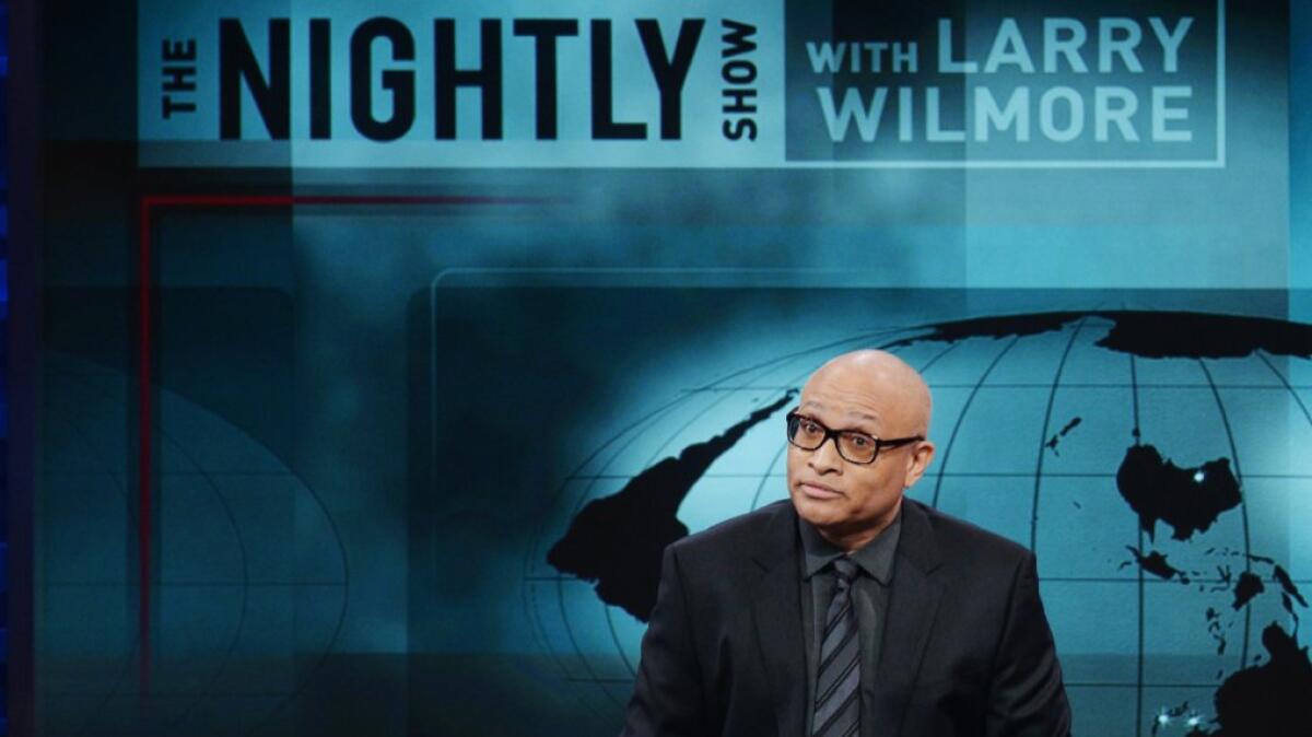 Host Larry Wilmore is shown in the debut episode of Comedy Central's "The Nightly Show" on Jan. 19, 2015. The network says it's canceling the late-night show.