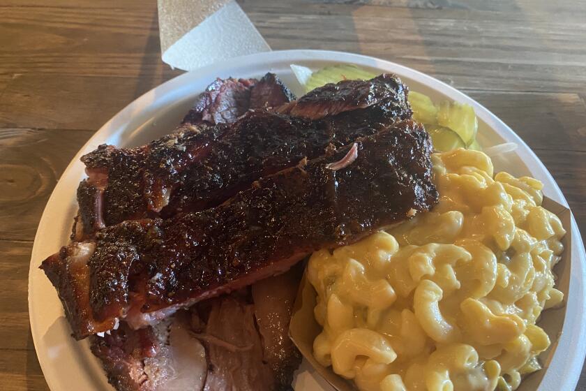 Brisket, ribs and mac and cheese at Pecan Lodge in Dallas.
