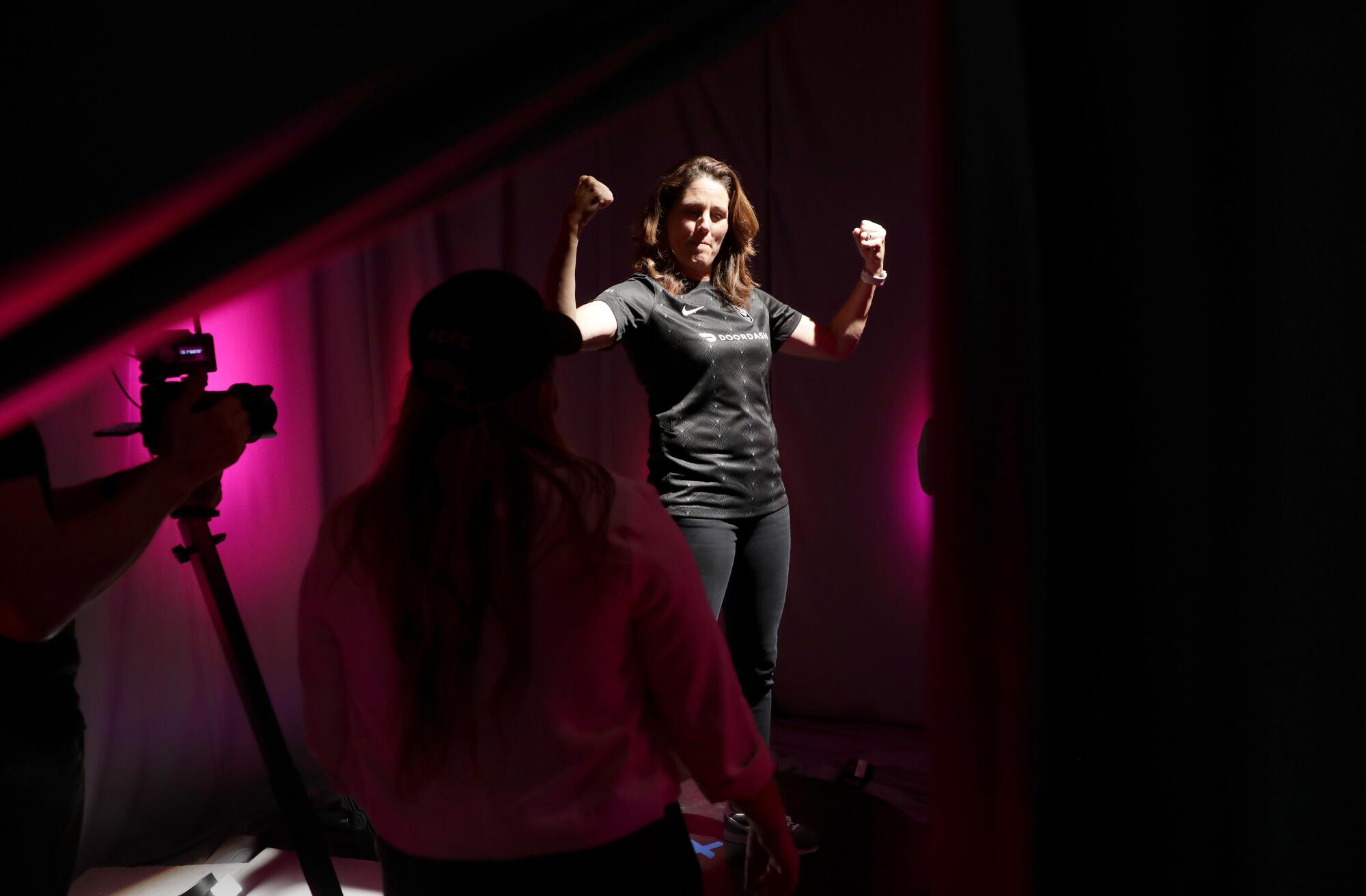 Julie Foudy wears the team's inaugural home jersey during a promo shoot at Angel City FC headquarters.