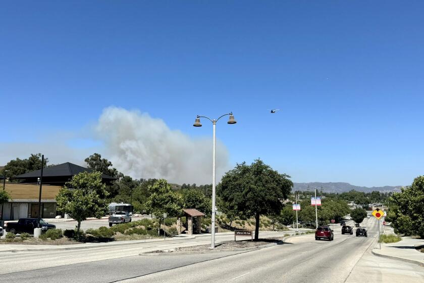 #Sharpfire; UPDATE - the fire is currently at 43 acres measured by sensory aircraft. This is a second alarm brushfire burning in Simi Valley off Sharp rd near Ditch rd. There are approximately 200 firefighters on scene. Multiple fixed wing aircraft and helicopters are attacking the fire from the air. Firefighters are using hose lines to attack the fire from multiple fronts.