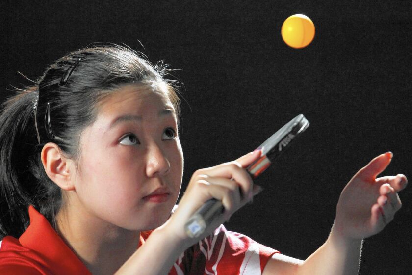 Lily Zhang, the world's highest-ranked player in her age group for table tennis, in the documentary movie "Top Spin."