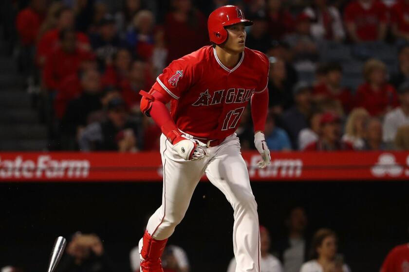 ANAHEIM, CA - APRIL 27: Shohei Ohtani #17 of the Los Angeles Angels of Anaheim watches the ball leave the park for a solo homerun on his way to first base in the second inning during the MLB game against the New York Yankees at Angel Stadium on April 27, 2018 in Anaheim, California. (Photo by Victor Decolongon/Getty Images) ** OUTS - ELSENT, FPG, CM - OUTS * NM, PH, VA if sourced by CT, LA or MoD **