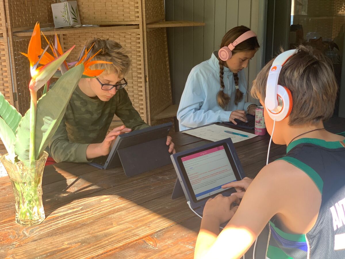 R. Roger Rowe students at work at the Brown family home.