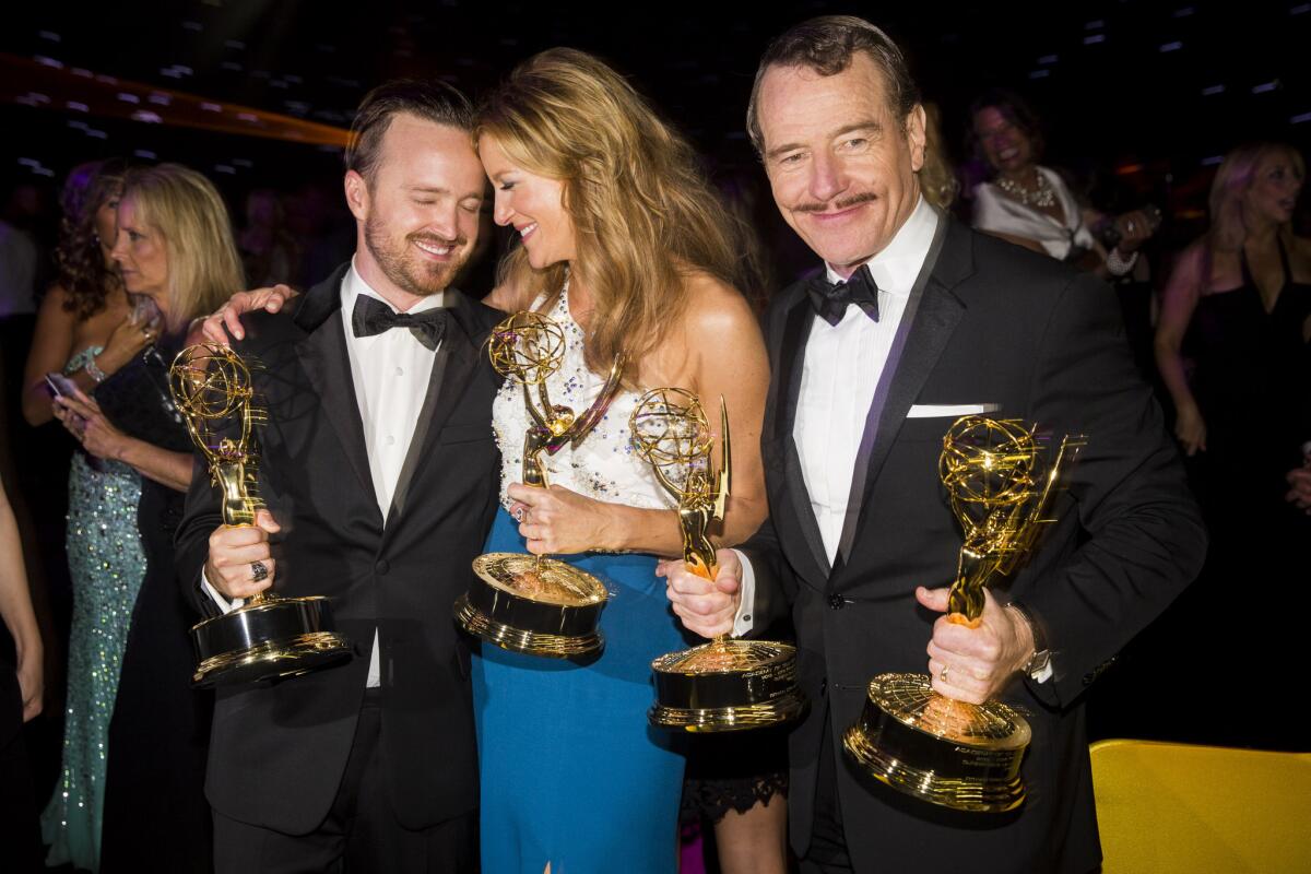Aaron Paul, left, Anna Gunn and Bryan Cranston of “Breaking Bad” at the Governors Ball. More Emmy and party photos at latimes.com/envelope.