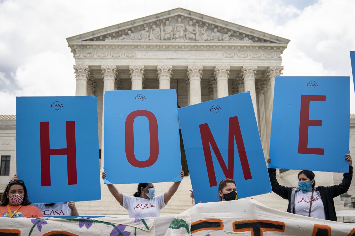 DACA recipients and their supporters rally outside the U.S. Supreme Court on June 18, 2020.