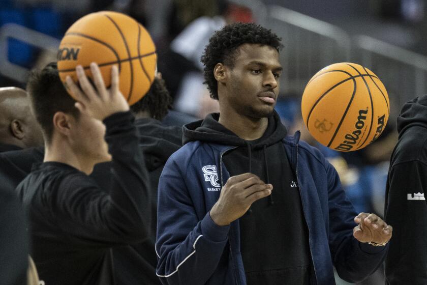 Los Angeles, CA - January 27: Sierra Canyon's Bronny James (0) tosses the ball around before a Mission League game against Notre Dame at Pauley Pavillion. (Kyusung Gong / For the LA Times)