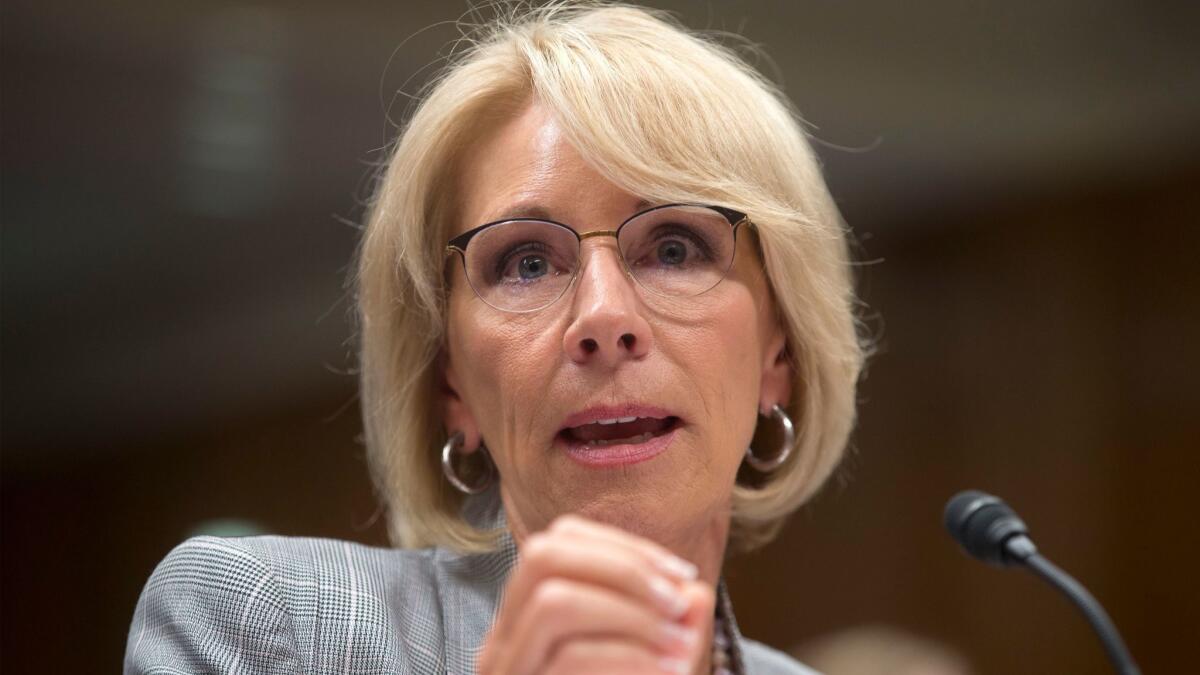 Education Secretary Betsy DeVos and her department can't use earnings data to grant partial loan forgiveness to Corinthian students — and that applies broadly, not just to four students, a judge ruled.