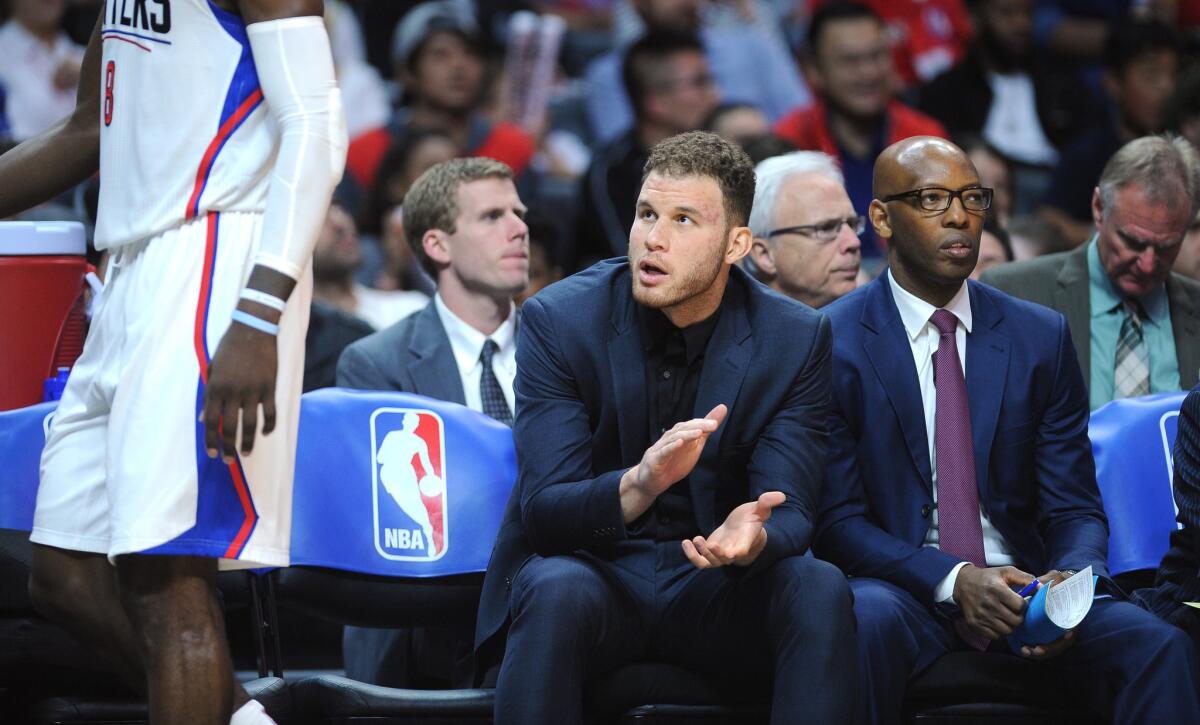 Blake Griffin sits on the Clippers bench during a game against the Cavaliers at Staples Center on March 13.