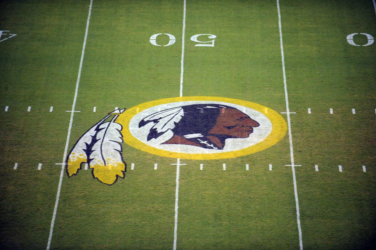 The Washington Redskins logo painted at midfield of FedEx Field.