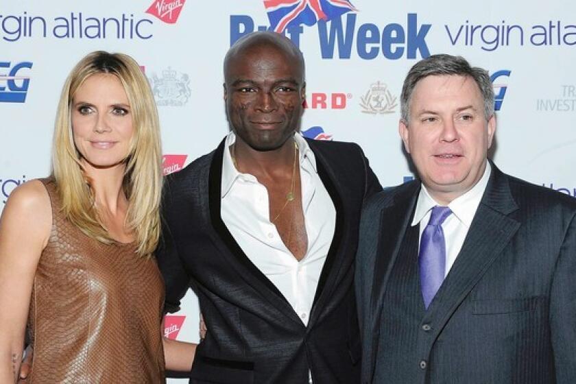 Heidi Klum, Seal and honoree Tim Leiweke arrive at the BritWeek gala in Los Angeles.