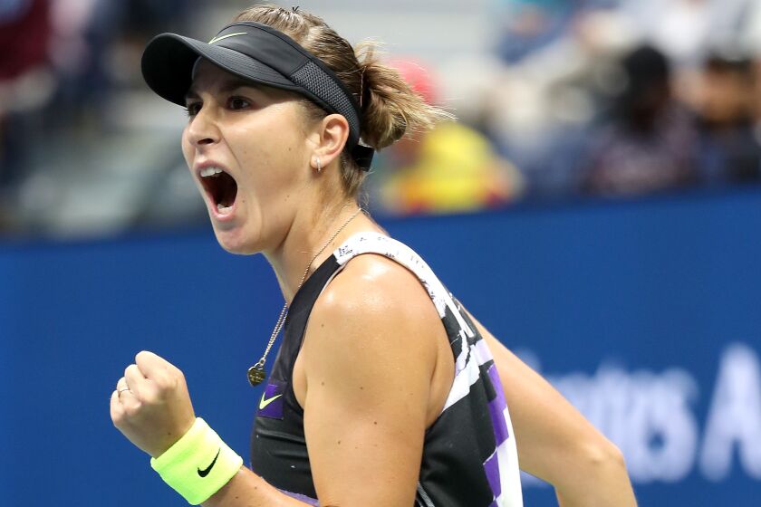 Belinda Bencic of Switzerland reacts during her U.S. Open match Monday against Naomi Osaka in New York. Bencic upset her top-seeded opponent in straight sets.
