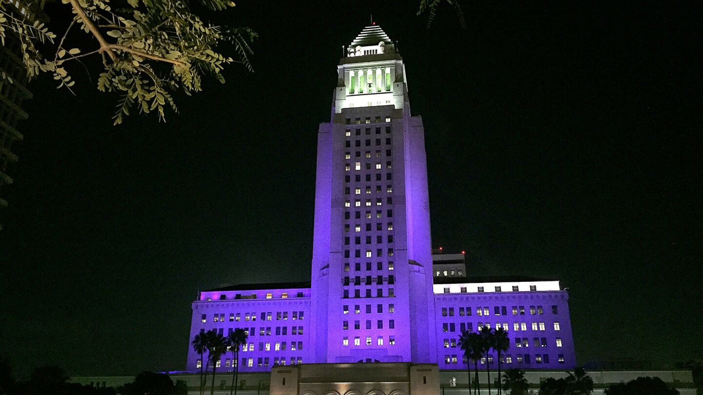 Los Angeles City Hall is decorated with purple lights in memory of Prince.