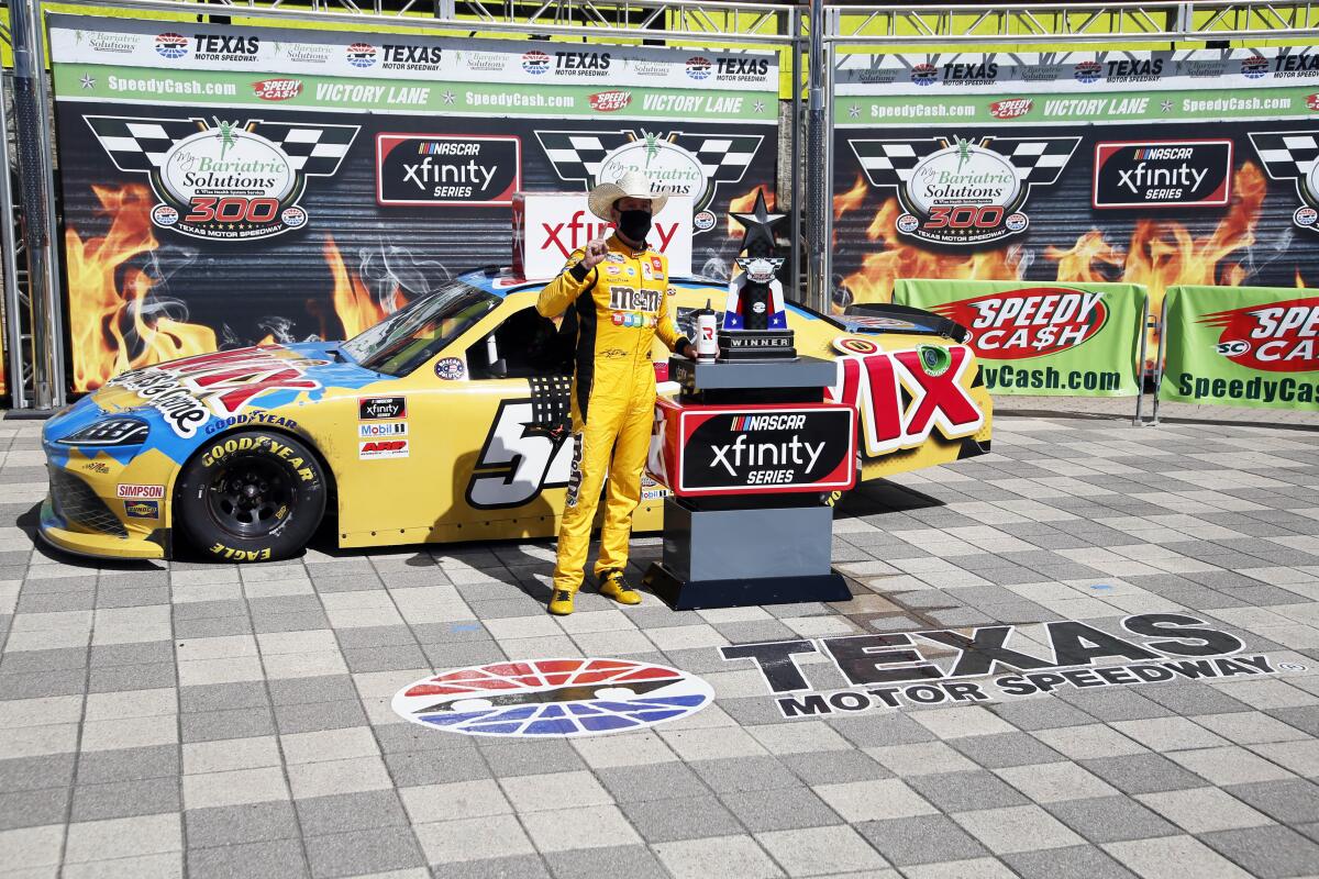 Kyle Busch celebrates after the NASCAR Xfinity race July 18, 2020. His win was taken away when his car was disqualified.