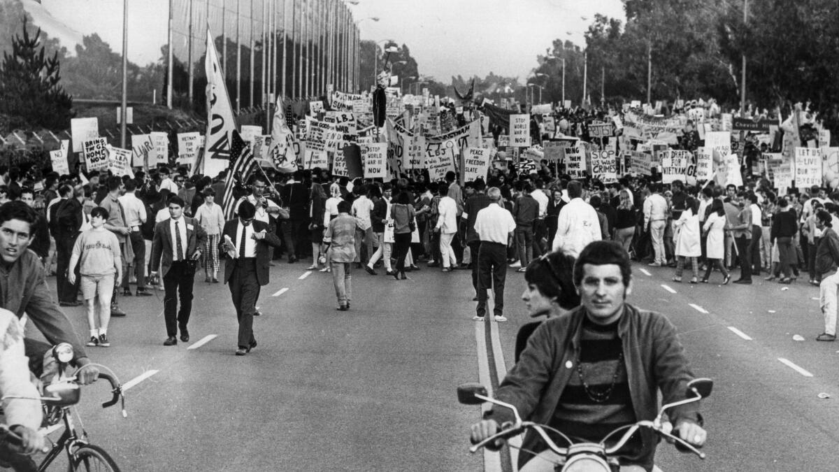 Protesters fill Motor Avenue as they march toward Century Plaza Hotel for a Vietnam War protest. This photo appeared in the Los Angeles Times on June 24, 1967.