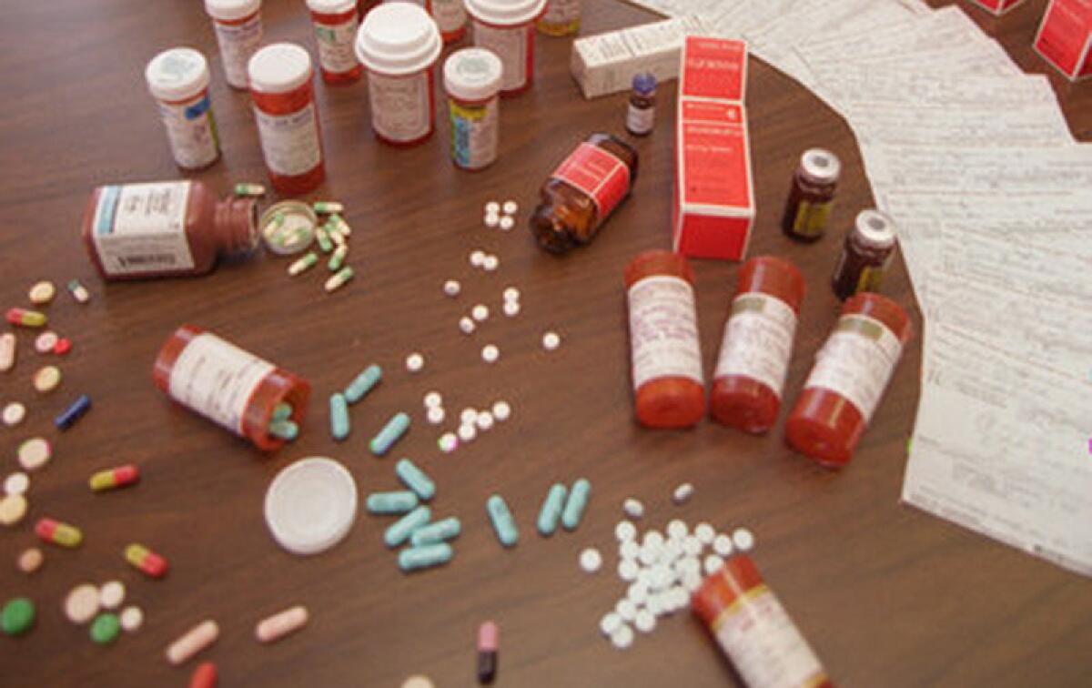 Federal authorities in Los Angeles on Tuesday announced charges against seven people who allegedly ran a trafficking ring of illegally-obtained prescription drugs out of a Los Angeles clinic. Pictured here are prescription drugs seized in unrelated raids in California.