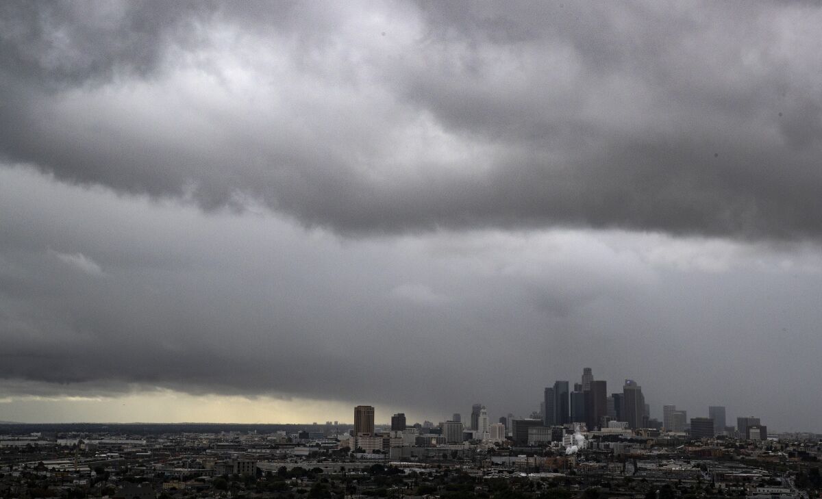 Clouds roll over the downtown Los Angeles skyscrapers.