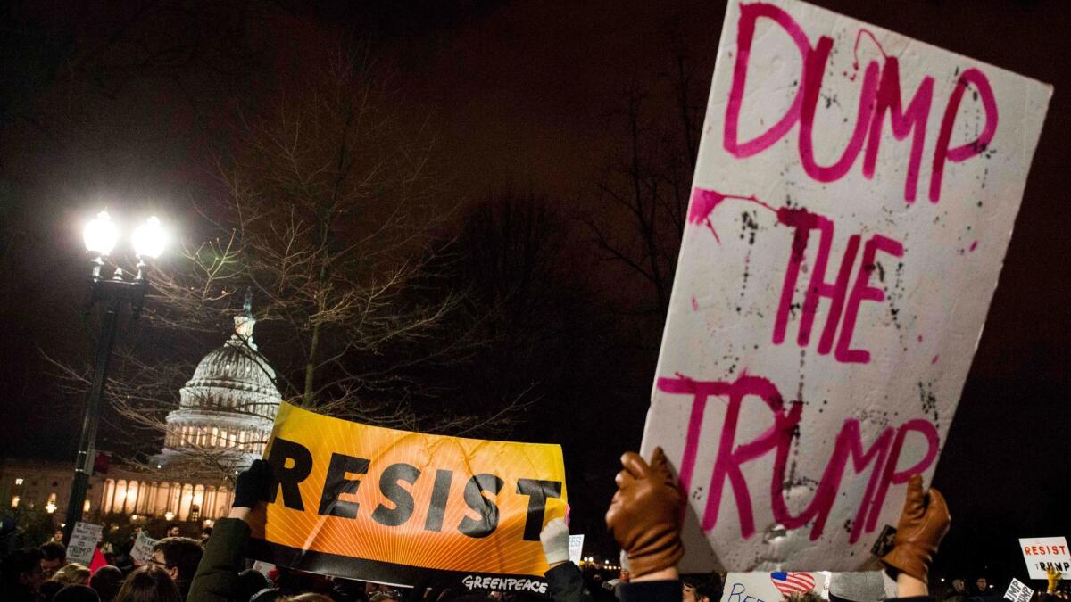 Demonstrators protest against US President Donald Trump and his administration's travel ban in Washington on Jan. 30.