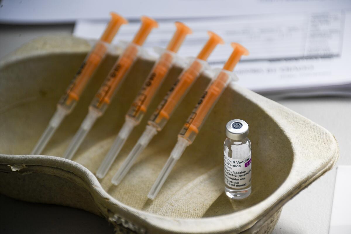 Syringes and vial of AstraZeneca's COVID-19 vaccine