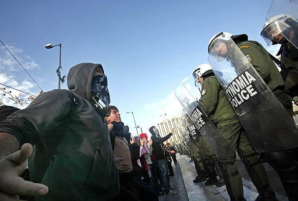 Rioting in Greece - Youths face off with riot police