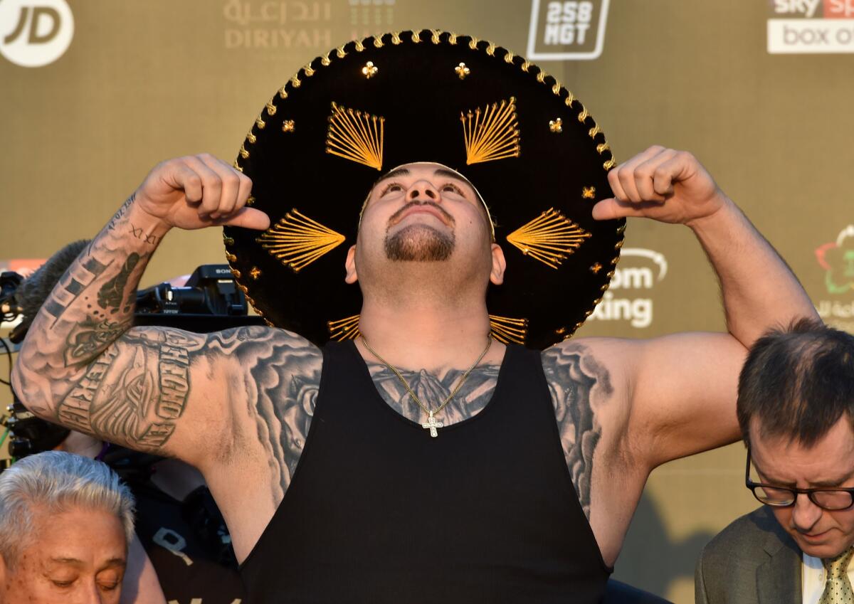 Andy Ruiz Jr poses during his official weigh-in for his match against Anthony Joshua.