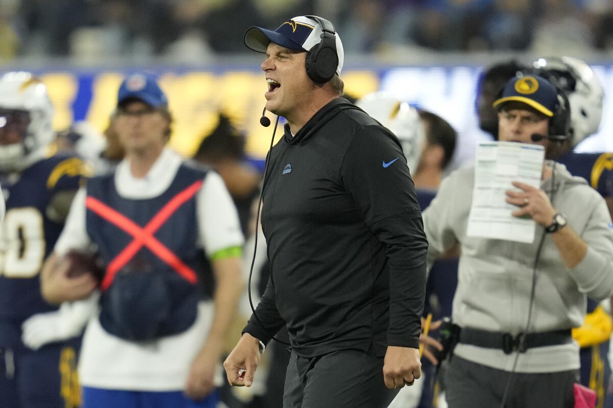 Chargers outside linebackers coach Giff Smith yells from the sideline during a game against the Baltimore Ravens.