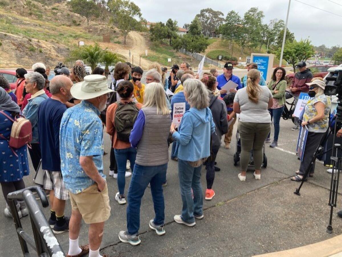 Community members standing outside the SDUHSD administration building before the May 19 meeting.