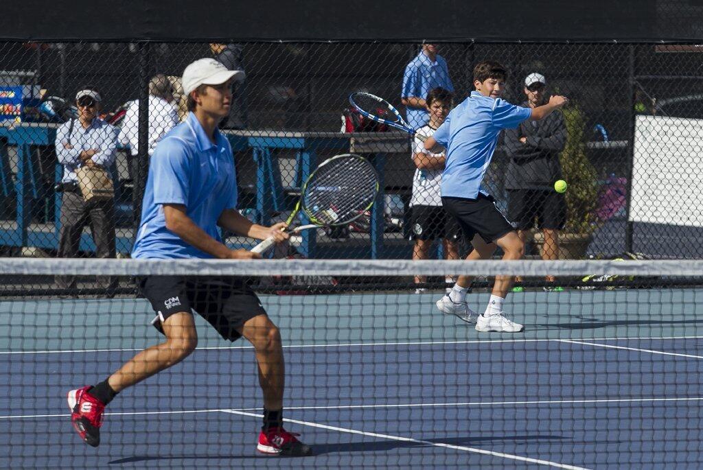 Corona del Mar High's Bjorn Hoffmann and his brother Nik Hoffman play a match against Sage Hill.