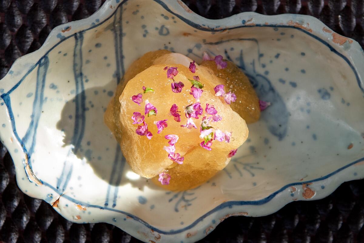 LOS ANGELES, CA - OCTOBER 28: Grouper shabu shabu with tosa-zu jelly and shiso blossoms from Hayato on Saturday, Oct. 28, 2023 in Los Angeles, CA. (Mariah Tauger / Los Angeles Times)